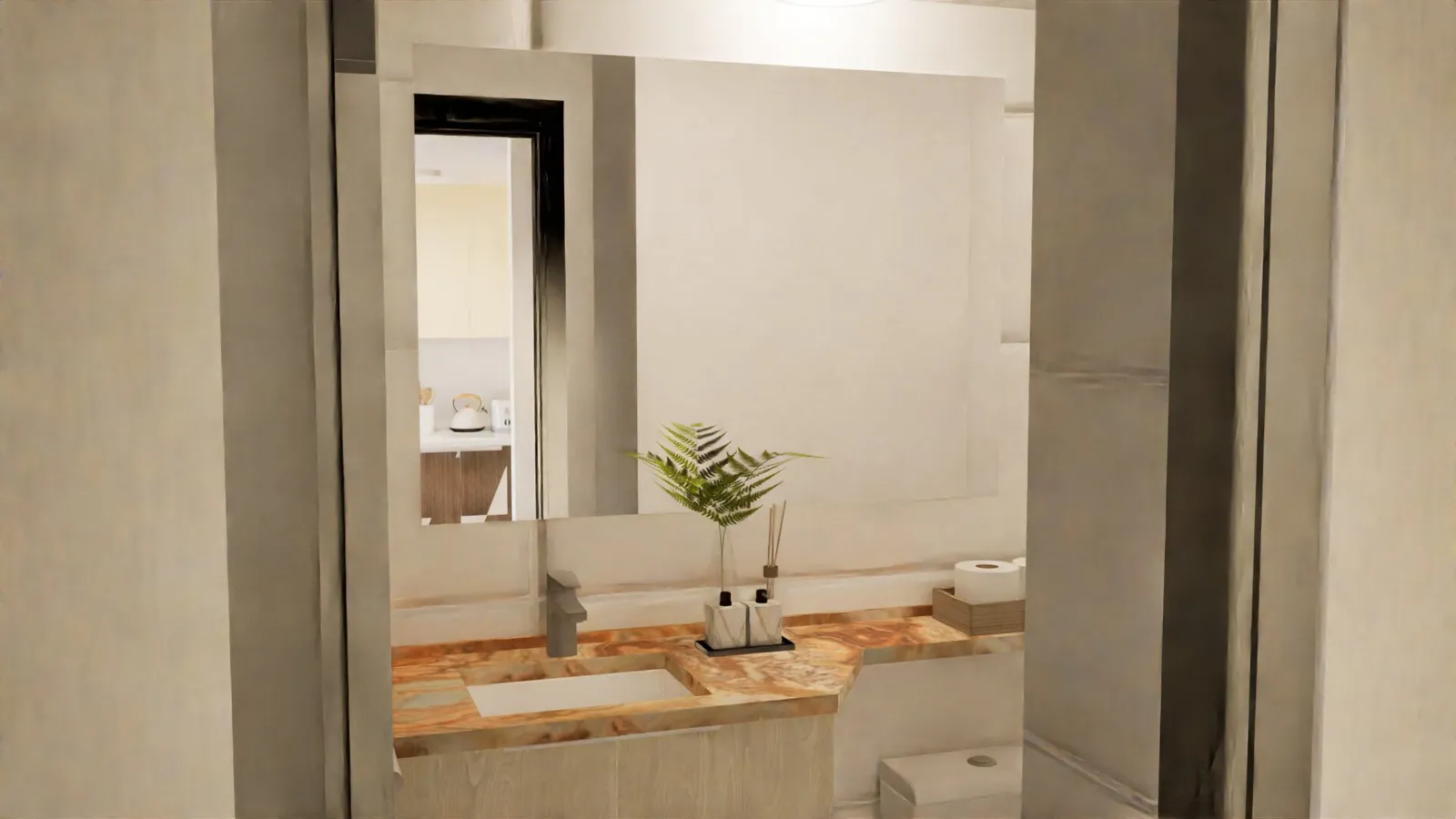 Baño con vanitorio en mármol y reflejo de la cocina